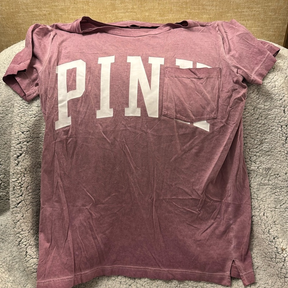 Size large Victoria’s Secret pink shirt. Only worn once or twice.